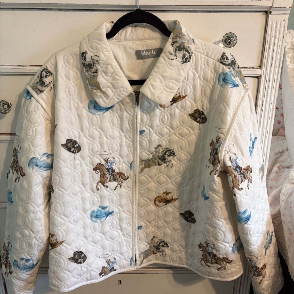 White Quilted Puffer with Horse Design